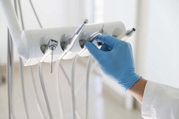 Professional Tooth Extraction technician working in Springville, IA